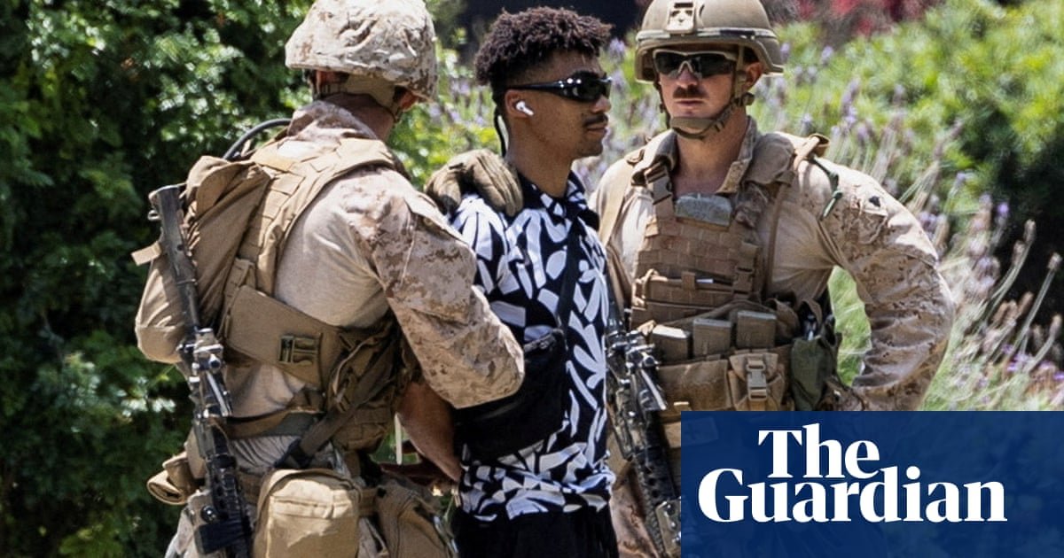 US marines detain civilian in first known instance since Trump deployed troops to LA | Los Angeles Ice protests