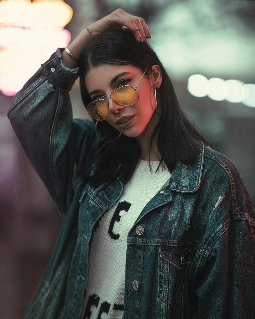 photo of woman in denim jacket